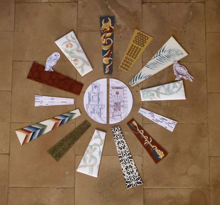 Shards of 3D textural artwork arranged to form a sun shape