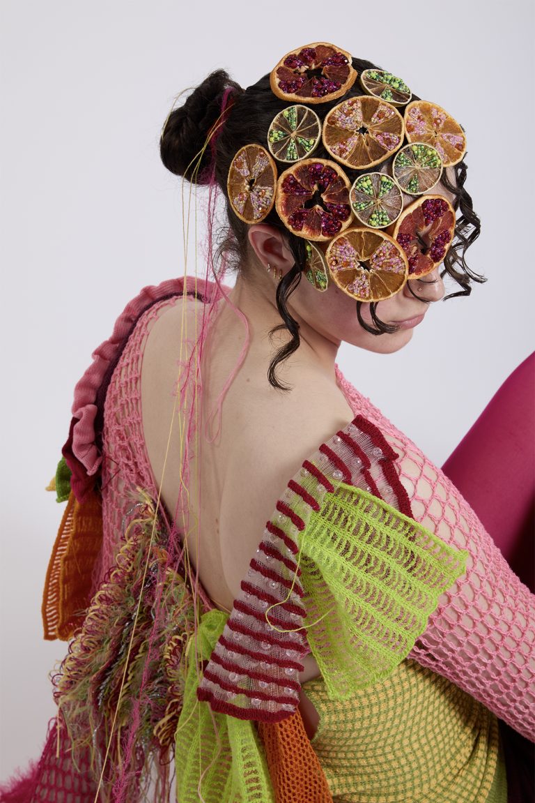 Textile work by Nina Lones showing embellished slices of dried fruit and colourful knitwear.