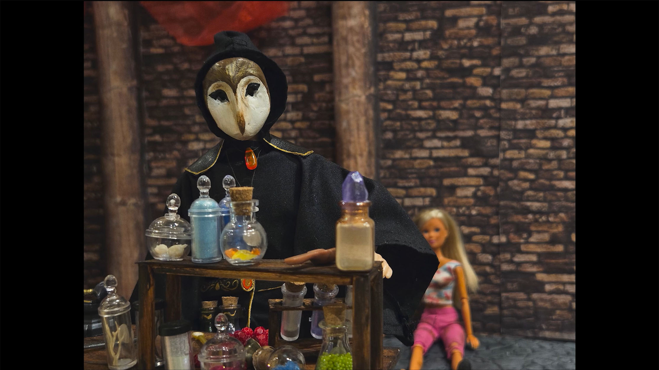 Stop motion animaltion work by Niamh Thompson. act one depicts a female doll prisoner transformed to be half owl through alchemical reactions, act 2 depicts the owl character being trapped in a painting as punishment and act 3 depicts the character breaking free