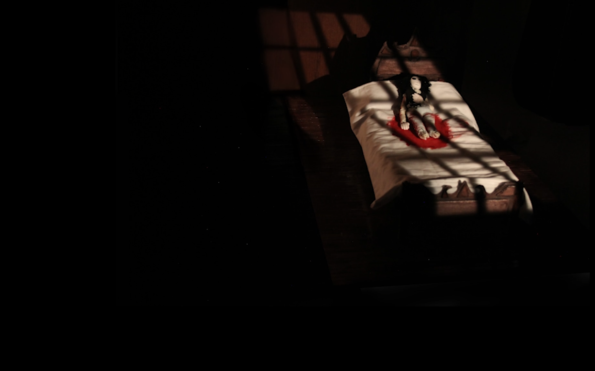 BA Animation: Work by Saffron Ritchie showing a short film depicting. A darkness that is empty but also suffocating shrouds Maria, our main character as she slowly finds her way through the eerily quiet empty mansion with only a lighter to guide her way.